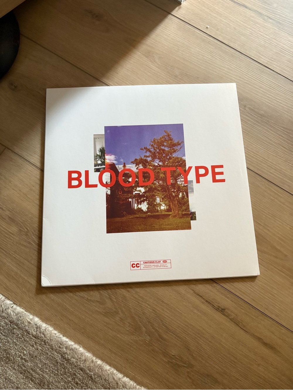 Cautious Clay Blood Type Album Vinyl - Bold Red Text on White Cover